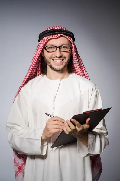 Arab man with paper binder — Stock Photo, Image