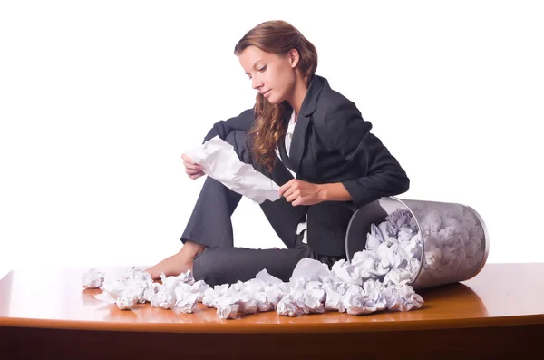 Woman with lots of discarded paper — Stock Photo, Image