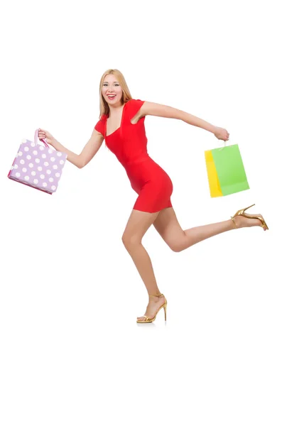 Mulher correndo com sacos de compras — Fotografia de Stock