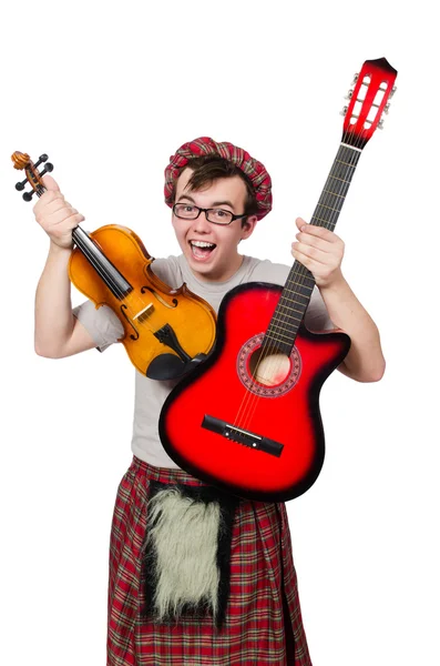 Engraçado escocês com instrumento musical — Stockfoto
