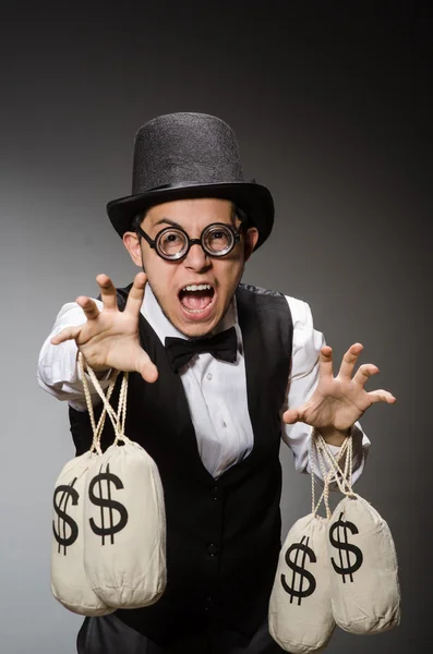 Egy férfi egy zsák pénzzel. — Stock Fotó