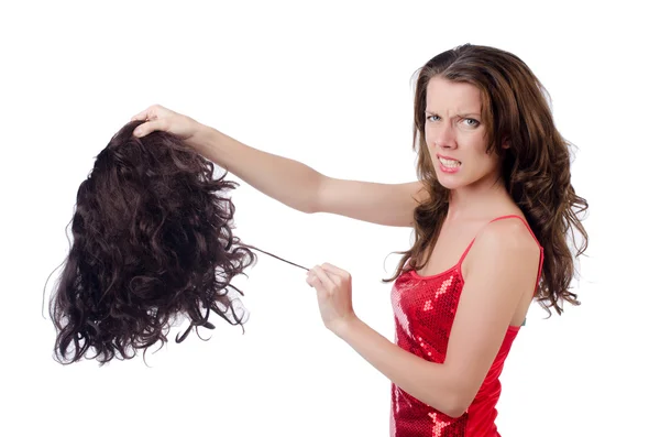 Woman with a selection of wig — Stock Photo, Image