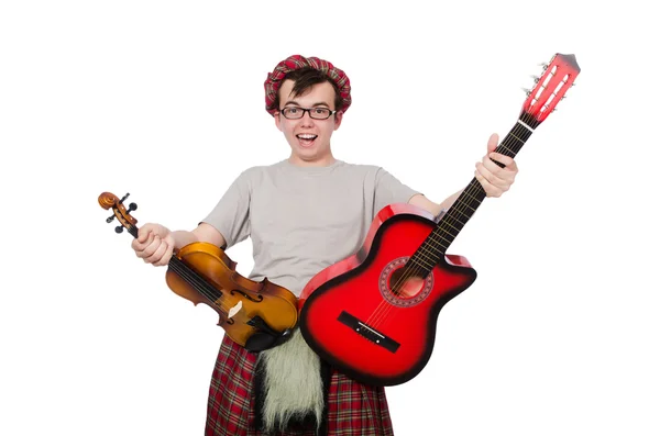 Смешной шотландец с музыкальным инструментом — стоковое фото