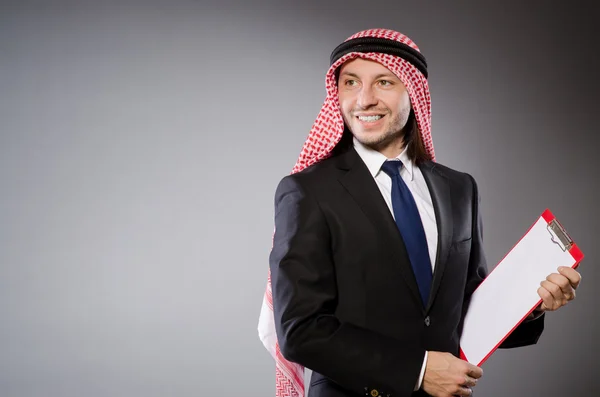 Arab man with paper binder — Stock Photo, Image