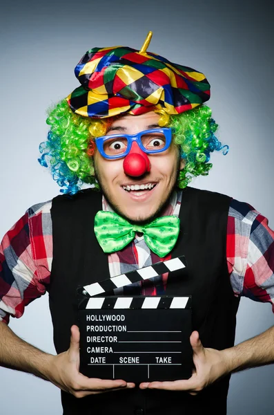 Clown with  movie board — Stock Photo, Image