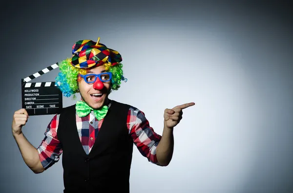 Clown with  movie board — Stock Photo, Image