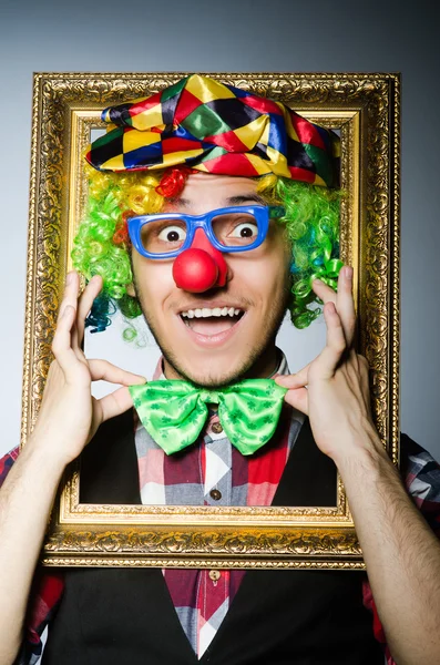 Клоун с рамкой — стоковое фото