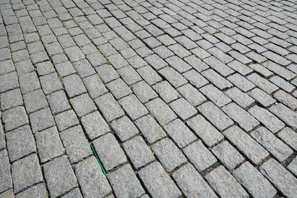 Straße mit Steinen gepflastert — Stockfoto
