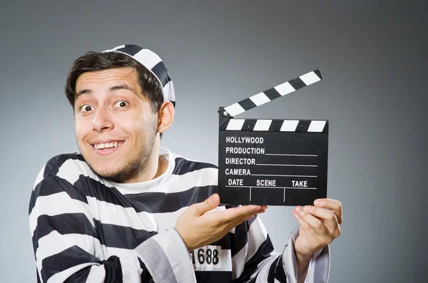Inmate with  movie clapper — Stock Photo, Image