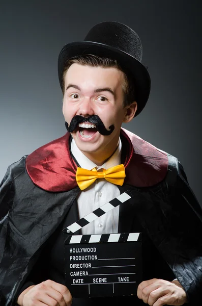 Man with movie clapper board — Stock Photo, Image