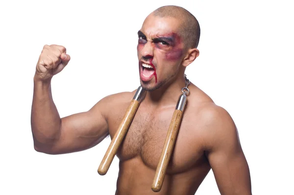 Uomo con i nunchaku — Foto Stock