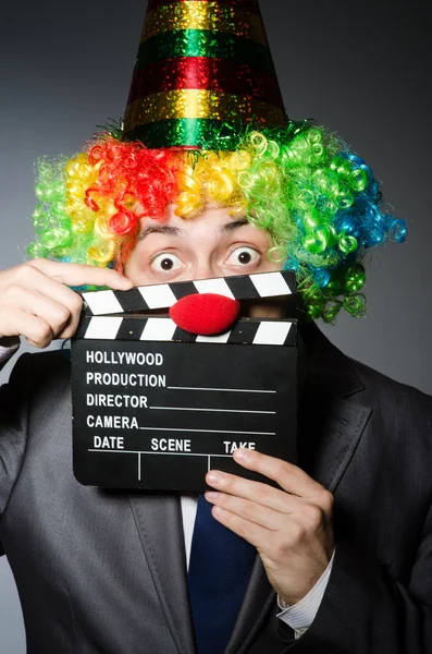 Clown med film styrelsen — Stockfoto