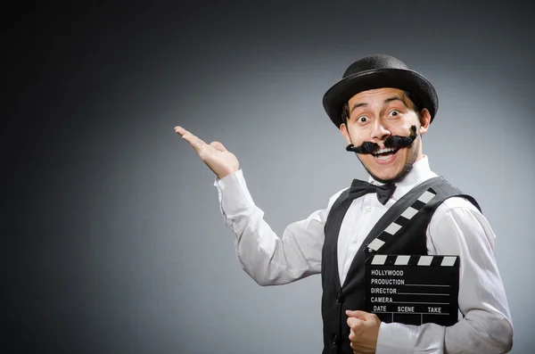 Man with movie clapper board — Stock Photo, Image