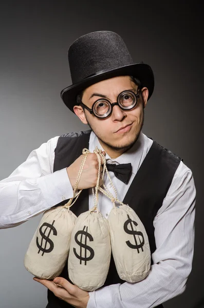 Hombre con sacos de dinero —  Fotos de Stock