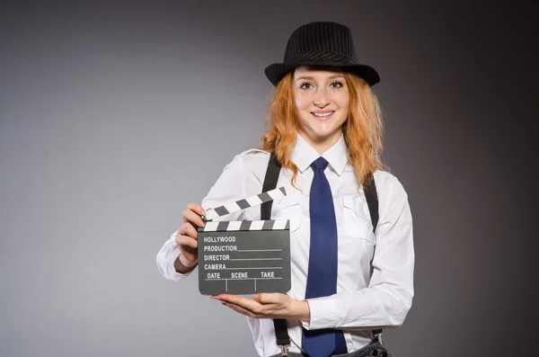 Woman with movie board — Stock Photo, Image