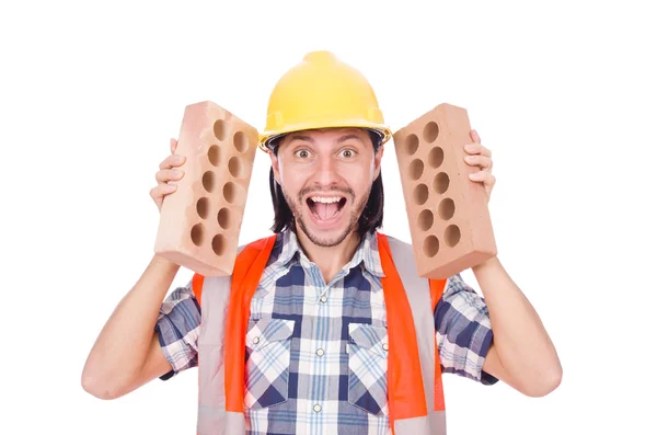 Construtor com tijolos de argila — Fotografia de Stock