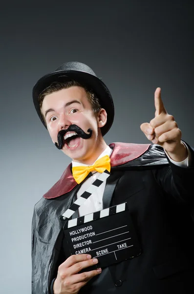 Man with movie clapper board — Stock Photo, Image