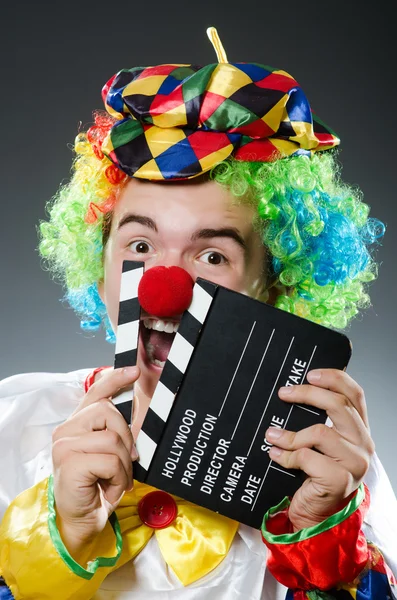 Clown med film styrelsen — Stockfoto
