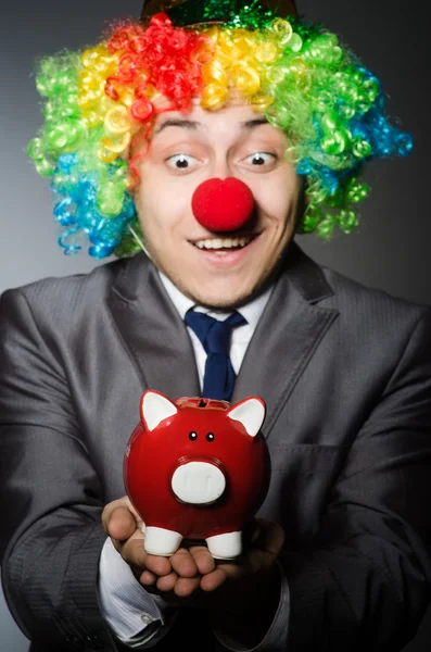 Clown med piggybank — Stockfoto