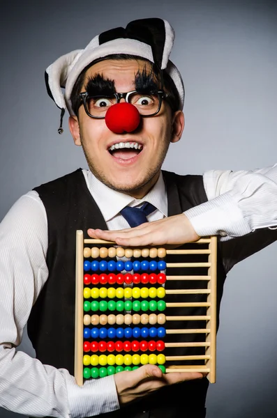 Funny clown with abacus — Stock Photo, Image