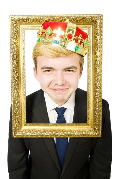 Businessman in crown with picture frame — Stock Photo, Image