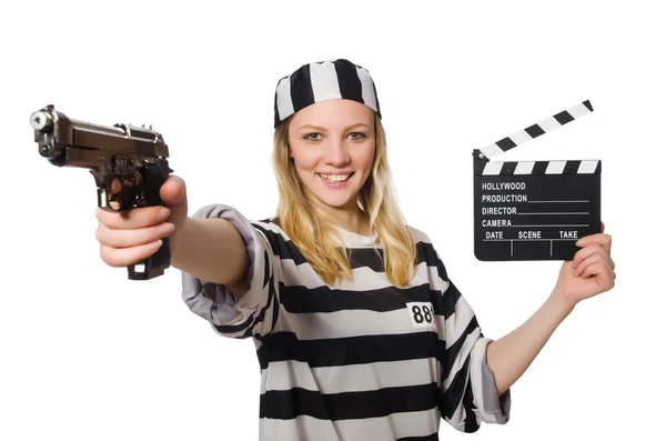 Funny prison inmate with clapboard and gun — Stock Photo, Image