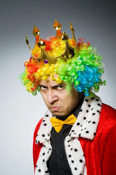 Podnikatel v král klaunské kostýmy — Stock fotografie