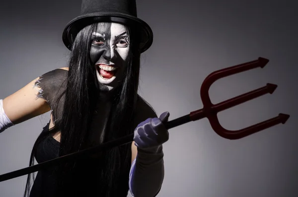 Satan woman with pitchfork and facemask — Stock Photo, Image