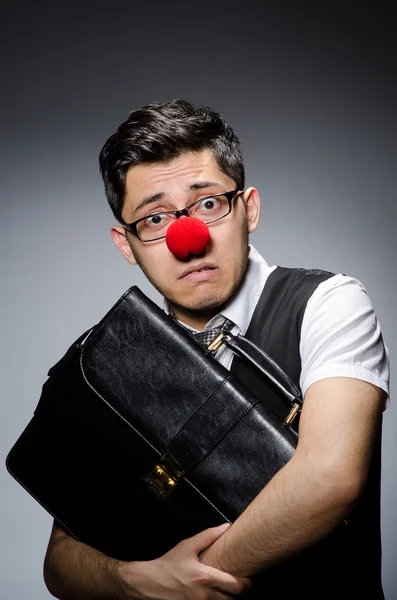 Funny businessman with clown nose — Stock Photo, Image