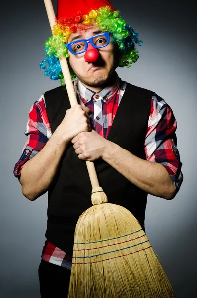 Funny clown with the broom — Stock Photo, Image