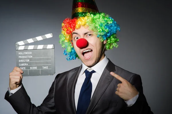 Clown with  movie board — Stock Photo, Image