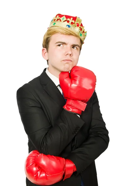 Empresário engraçado com coroa e luvas de boxe — Fotografia de Stock