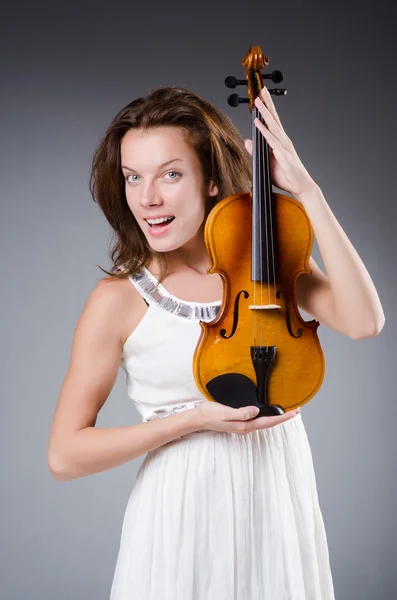 Woman artist with violin in music concept — Stock Photo, Image