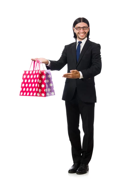 Homem com sacos de compras isolados em branco — Fotografia de Stock