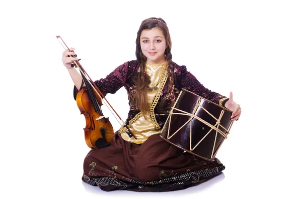 Young woman playing musical instruments on white — Stock Photo, Image