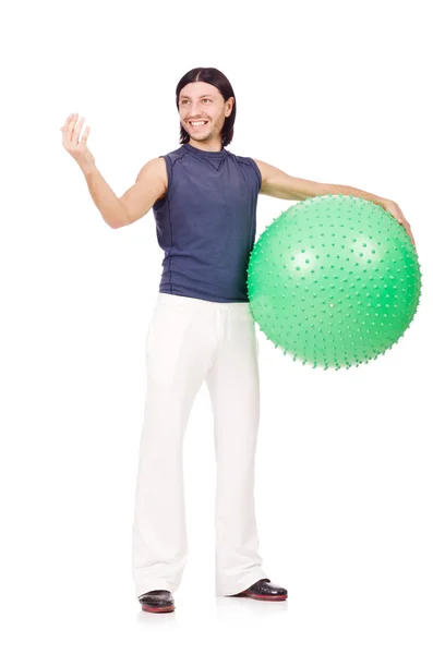 スイスのボールを持つ男は白い上に演習を行う — ストック写真