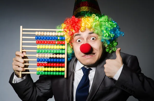 Legrační klaun obchodník s Abacus — Stock fotografie
