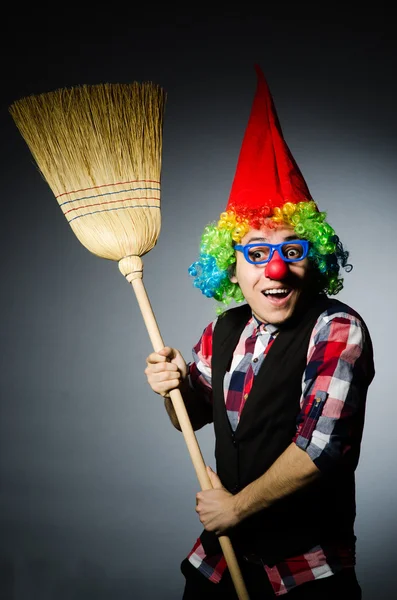 Funny clown with the broom — Stock Photo, Image