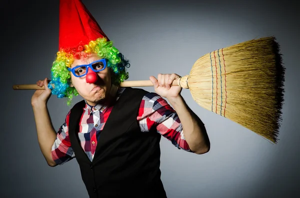 Funny clown with the broom — Stock Photo, Image