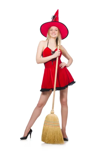 Witch in rode jurk met bezem — Stockfoto