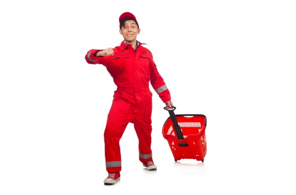 Man in red coveralls with shopping supermarket cart trolley — Stock Photo, Image