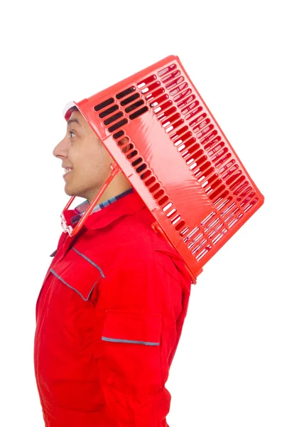 Άνθρωπος στην κόκκινη ολόσωμη φόρμα με ψώνια καλάθι άμαξα του σούπερ μάρκετ — Φωτογραφία Αρχείου