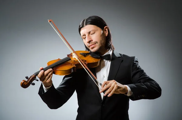 Uomo violinista nel concetto musicano — Foto Stock