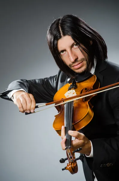 Uomo violinista nel concetto musicano — Foto Stock