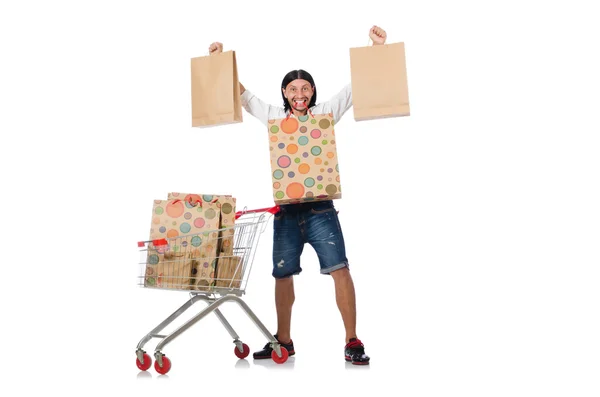 Mann kauft mit Einkaufswagen im Supermarkt ein — Stockfoto