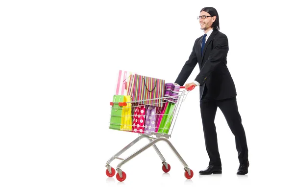 Uomo shopping con carrello supermercato isolato su bianco — Foto Stock