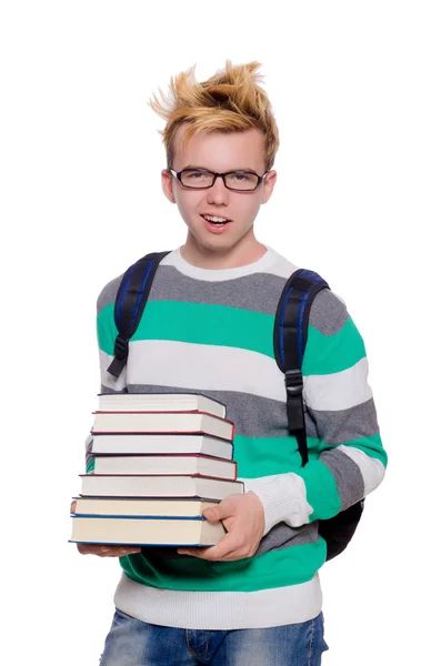 Estudante engraçado com pilha de livros — Fotografia de Stock