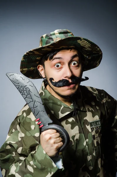 Funny soldier against the dark background — Stock Photo, Image