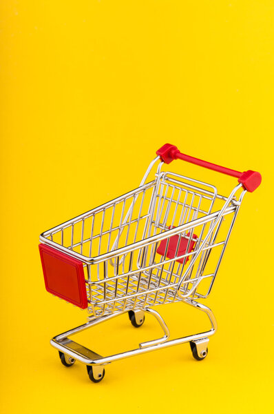 Shopping cart on seamless background