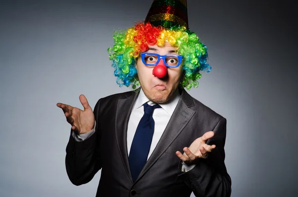 Clown homme d'affaires dans le concept drôle — Photo